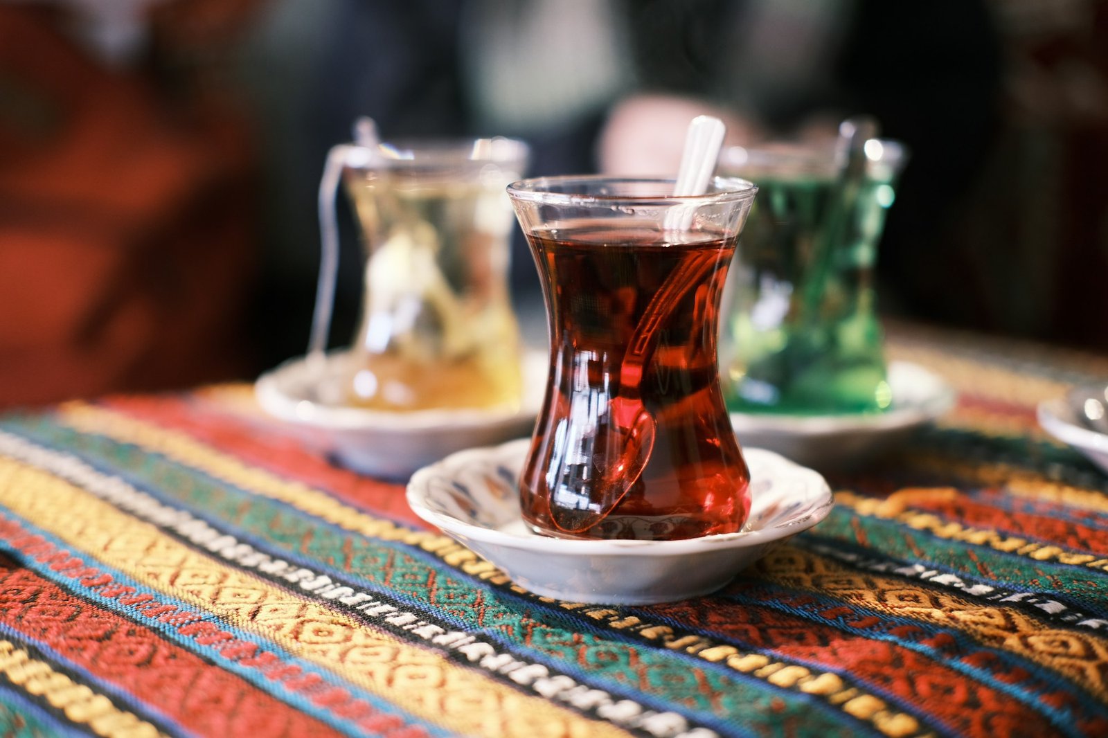 Turkish tea in tulip glass on kilim